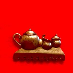 Tea service pin, on a shelf with a dangling teacup , Danforth , Pewter , vintage